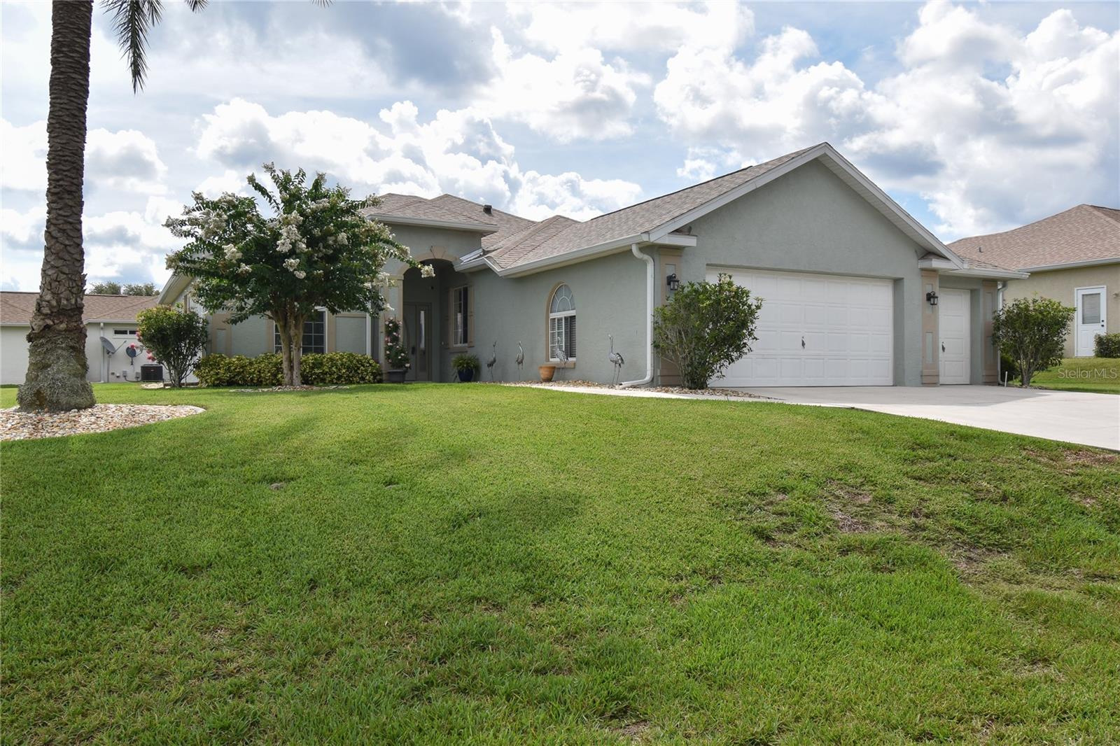 MOST DESIRABLE MODEL WITH OPEN FLOOR PLAN ON CORNER LOT WITH GOLF CART GARAGE. Roof-(2/2023), A/C-(8-2020), Water Heater-(6-2020), Appliances replaced-(9-2023). This 3BD/2BA house has an open floor plan with a view of the kitchen and the Florida room. The large living room has room for a large, screen television with high ceilings. The kitchen has a built-in microwave, time-saving dishwasher, clear-top range and a refrigerator with plenty of storage. The laundry room is located off the kitchen with easy access to the garage for easy entry. The dining room has a view of the Florida room and the back yard. The Master Bedroom has a large walk-in closet and room with plenty of furniture including a king-size ped. The Master bathroom has recently been remodeled with a new walk-in shower and a new double sink vanity with plenty of storage. The 2nd and 3rd bedrooms have built-in closets. The guest bathroom has a new vanity, faucet and a full tub and shower. The Florida room has a great view of the backyard and has ample room for your furniture. This house has a 2-car garage plus a golf cart garage for storing your golf cart or for extra storage. This house is located close to the back gate for easy access to our community. This house is priced to sell! Ocala Palms is a gated active 55+ community located on North Highway 27 in Ocala, Florida. This community offers an 18-hole Golf Course for golf enthusiasts and Country Club-Style living for active adults. Golfers can also practice on the driving range and putting green so they can step up their golf game skills. It boasts a 19,000 square-foot clubhouse. Here is a sample of activities and amenities offered: Clubhouse/Amenity center, fitness center, Outdoor Olympic pool, hot tub, heated indoor pool, card room, arts & crafts studio, ballroom, library, billiards, bocce ball, shuffleboard courts walking & biking trails, volleyball court, tennis/pickleball courts, horseshoe pit, and croquet lawns. Ocala Palm is a very family friendly community and is located close to shopping centers, supermarkets, drug stores, restaurants, banks, doctors’ offices, hospitals, postal office department stores, etc. For family entertainment, Ocala features year-round public festivals events, canoeing, kayaking, paddle boating, horseback riding, fishing, etc. Close to tourist attractions like World Disney Parks, Universal Studios, Sea World, Bush Garden, World Equestrian Center, numerous beaches, etc. All measurements are approximate. Buyer(s) to re-measure.
