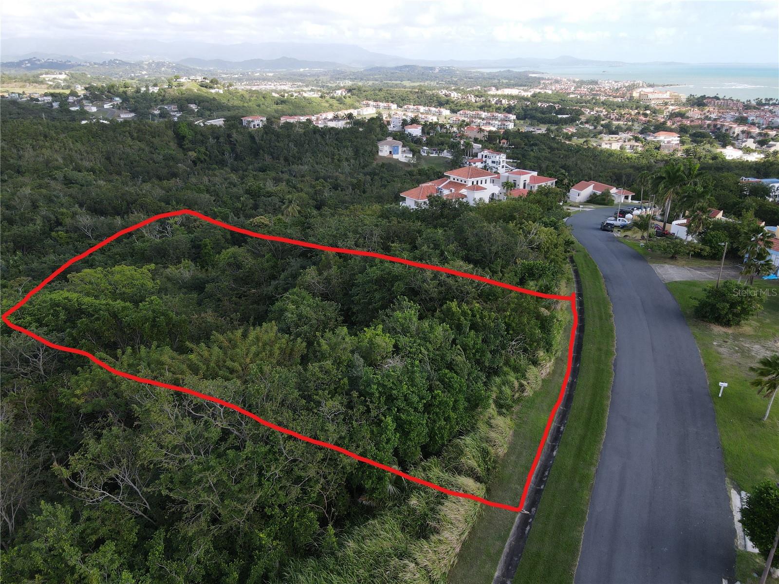 This is a 2,381 square meters lot located on Port Road street at Palmas Del Mar, Humacao. This is the opportunity to build your dream home with a stunning ocean view.