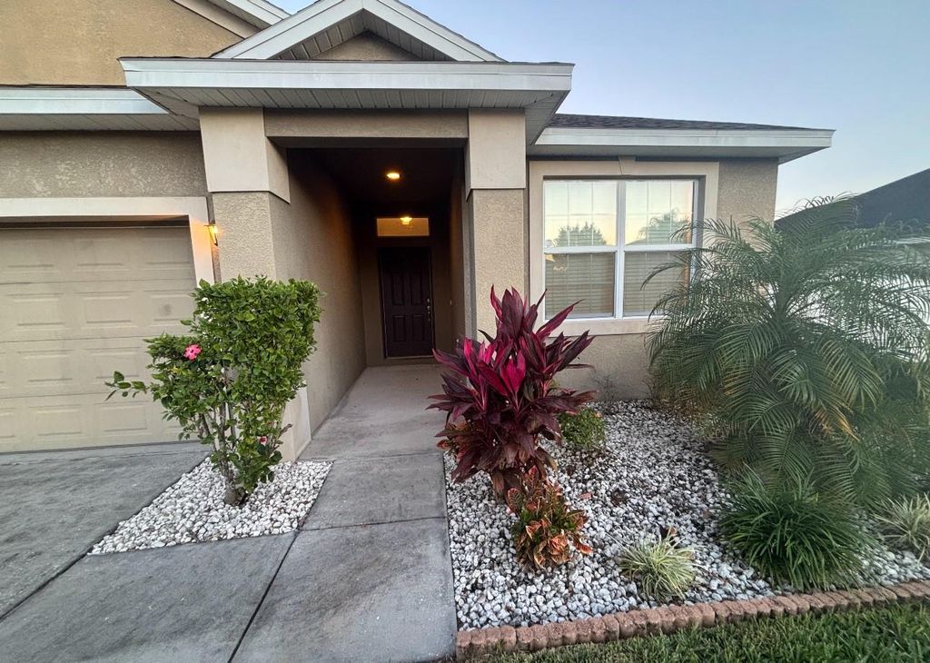 Photo of 140 Highland Meadows Street, Davenport, FL 33837 (MLS # S5140740)