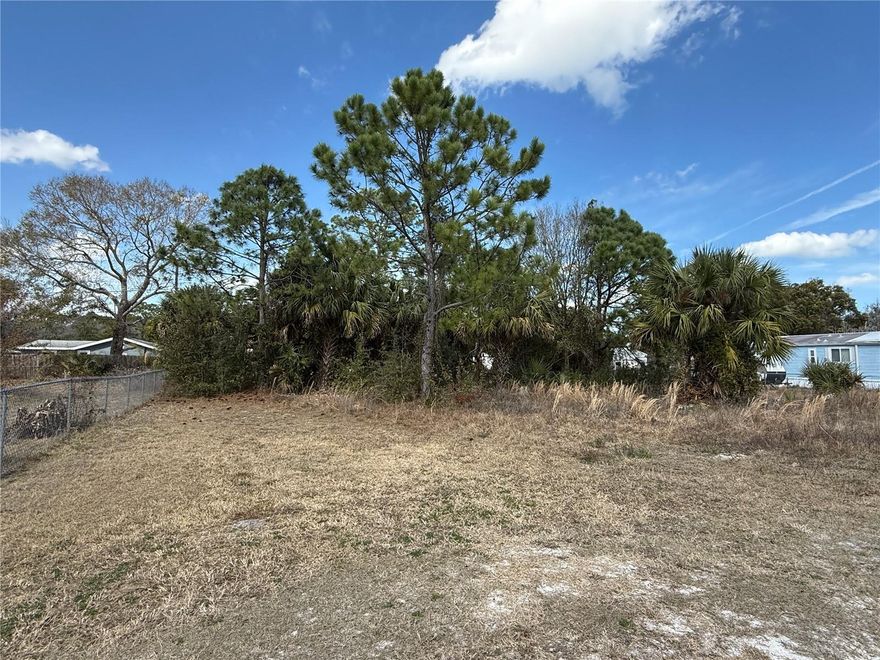 Affordable living on this tranquil vacant land about 5-10 minutes to the beach. This property is near a scenic bike trail and a rustic airfield strip offering endless opportunities for outdoor exploration and aviation enthusiasts alike.  Nestled in a beautiful area, the land boasts level ground and is partially fenced for added privacy, creating a blank canvas for your vacation retreat.  Immerse yourself in the quiet ambiance of this peaceful locale, just moments to the sun-kissed shores of the beach.
