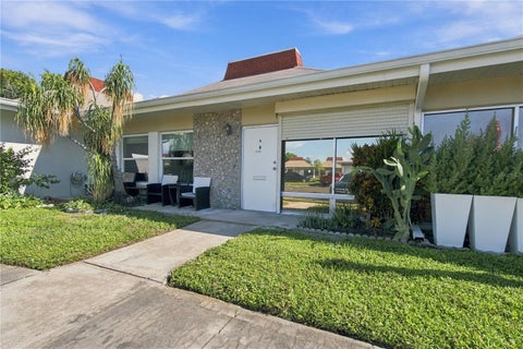 Photo of 4359 Tahitian Gardens Circle #B, Holiday, FL 34691 (MLS # TB8548421)