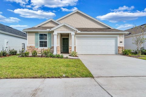 Photo of 127 W Waverly Lane, Palm Coast, FL 32164 (MLS # FC312505)