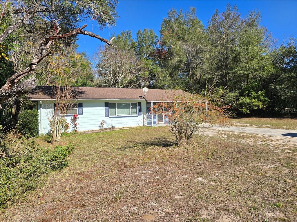 Photo of 19901 SW Rainbow Lakes Boulevard, Dunnellon, FL 34431 (MLS # OM716876)