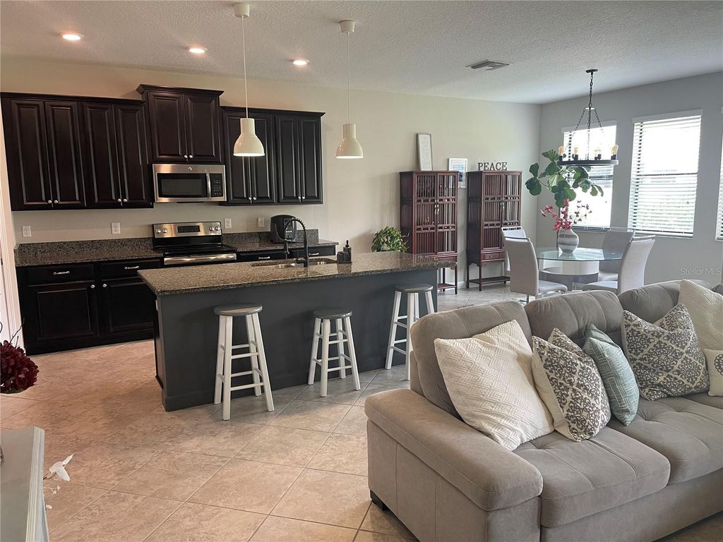 Photo of 1596 Ludington Avenue, Wesley Chapel, FL 33543 (MLS # TB8402677)