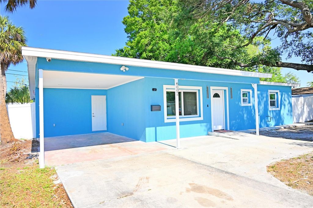 Photo of 6002 Town N Country Boulevard, Tampa, FL 33615 (MLS # TB8480952)