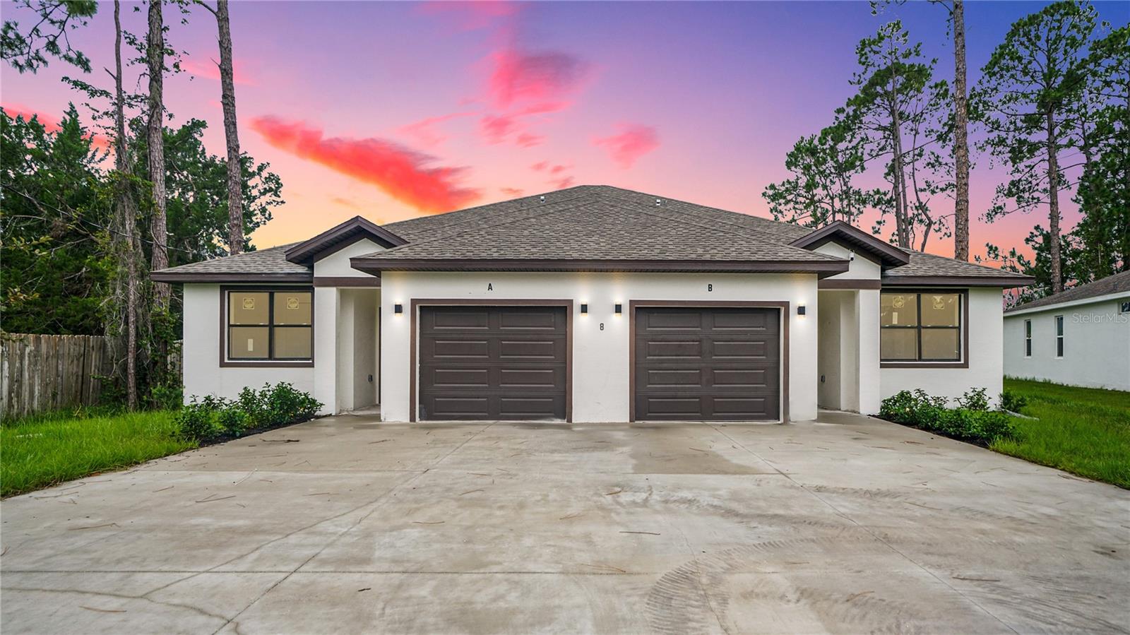 Stunning new 2025 duplex with 10 ft ceilings, porcelain tile, and luxury vinyl plank flooring throughout. This well designed property offers a total of 6 bedrooms and 4 bathrooms each unit featuring 3 bedrooms, 2 bathrooms, and a spacious open concept layout. Interior highlights include luxury vinyl plank flooring, quartz countertops, contemporary cabinetry, and designer lighting. A generous backyard provides ample space for outdoor living or future enhancements, and a 2 car garage offers added convenience. Situated on a quiet cul-de-sac in the desirable area of Palm Coast, this property offers proximity to top rated schools, shopping, parks, and a short drive to the Intracoastal Waterway and beaches. An excellent option for both owner occupants and investors seeking strong rental income potential.