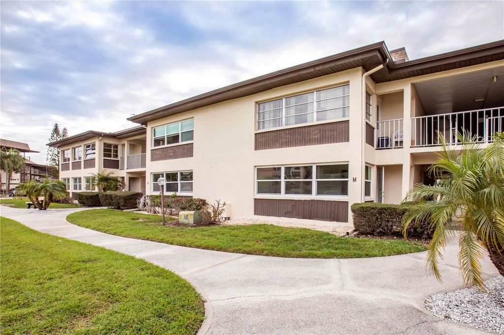 Photo of 4712 Marine Parkway #104, New Port Richey, FL 34652 (MLS # W7873195)