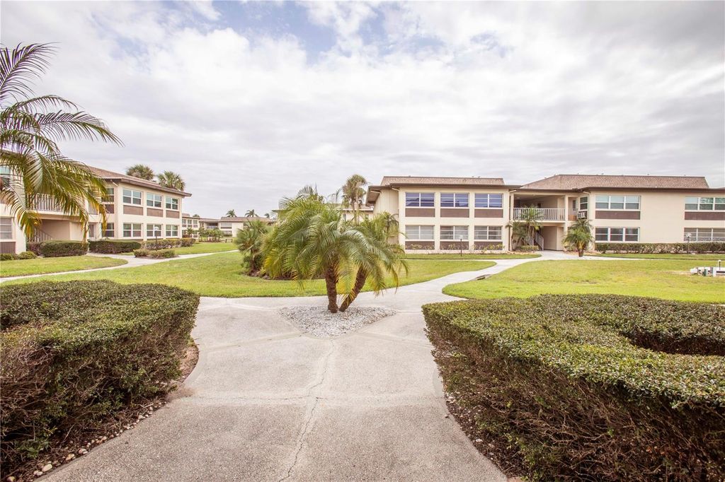 Photo of 4712 Marine Parkway #104, New Port Richey, FL 34652 (MLS # W7873195)
