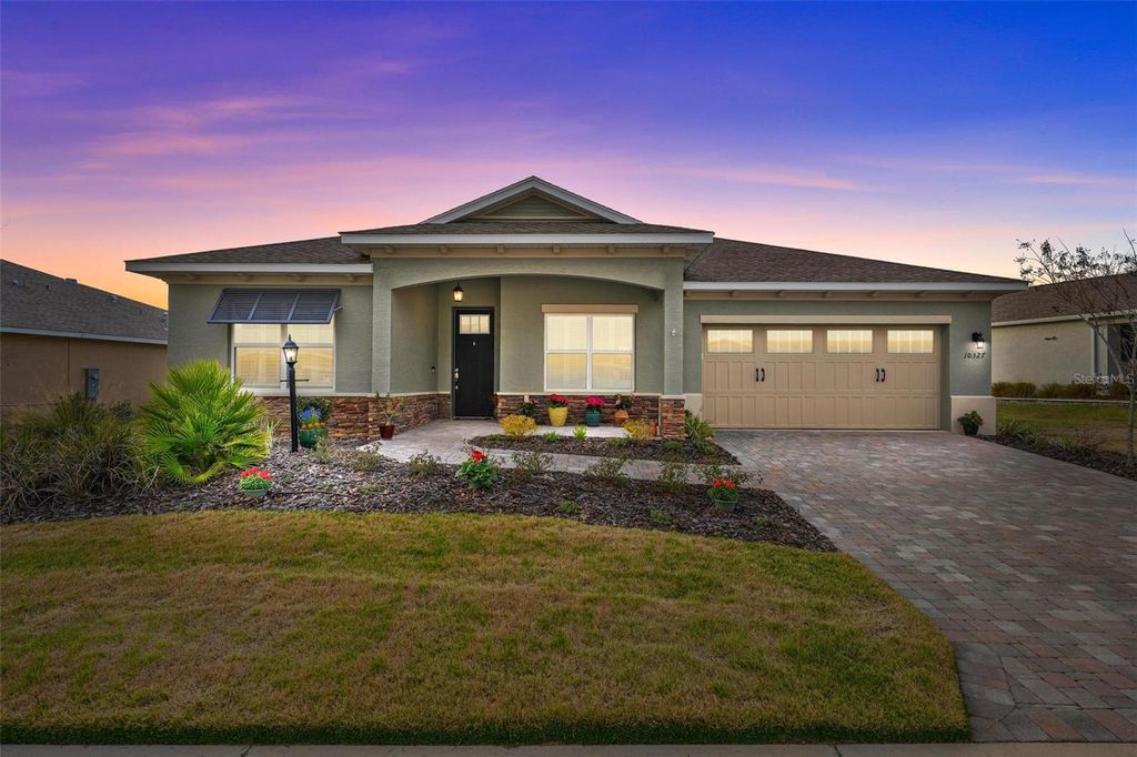 Photo of 10327 SW 96th Loop, Ocala, FL 34481 (MLS # OM720150)