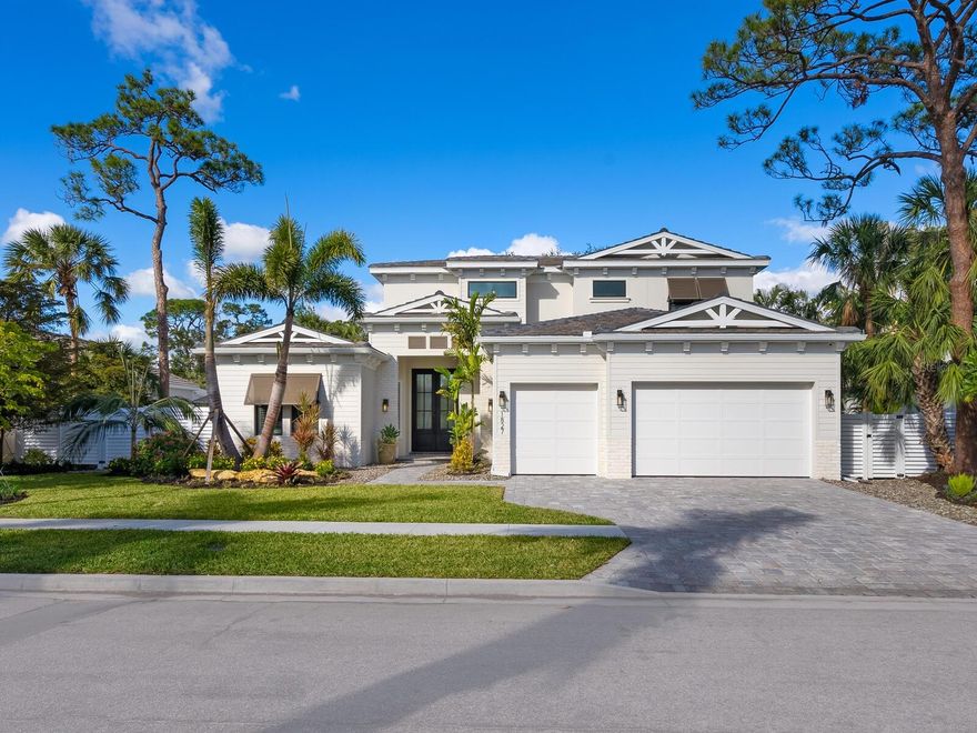 The “St. Michael” is award-winning Allegra Homes’ 2025 fully furnished model home supremely located just south of downtown Sarasota’s cultural epicenter in the coveted West of Trail area where residents know first-hand what a wonderful community they live in. Prepare to be captivated by the seamless fusion of modern design, artful nuances, and stylish sophistication. Every detail has been curated to create an inviting ambiance of gracious family living for years to come. This Coastal 4 bedroom, 4.5 bath luxury property spans 3,970 sq. ft. of open living offering unrivaled comfort and tranquility. Giving the home a feeling of expansiveness, the grand foyer opens to reveal the great room’s 2-story wood-beamed ceiling highlighted by a gorgeous chandelier. Clerestory windows fill this room with natural light and 2 glass sliders frames the alluring outdoor living area, inviting the outside in. The entire back of the home is dedicated to the screen enclosed space offering a heated saltwater pool/spa, covered dining and lounging areas with large screen TV, and year-round kitchen with deluxe cooking amenities. While enjoying a glass of wine, the evening sky hosts unforgettable sunsets painted in vibrant hues of yellow, red and orange. This fascinating oasis is accessible through a wall of glass sliders from the bonus room offering a wet bar and pool bath. The backyard is fenced for privacy and safety, and the lush landscape has been professionally designed and executed to perfection. An elaborate island kitchen is specially-equipped with the best in luxury appliances and will satisfy every desire of your home chef. The aptly sized dining room with a built-in buffet and lovely pool view will become a favorite spot to savor time spent with family and friends. The primary suite with adjoining study is a true retreat from the ordinary with an amazing drop tray tongue-and-grove ceiling, relaxed sitting area, direct access to the pool, expansive walk-in closet, separate double vanities, and a tastefully tiled stall encompassing both a rainfall shower and glamorous soaking tub within its 8 ft. glass walls. The elegant staircase with floating steps and glass railing takes you to a second bonus room, 2 additional bedrooms and a bath. So many other great features are included like a 3-car garage, custom light fixtures and fan, hurricane impact Low-E windows and sliding doors, stone faced TV wall in great room flanked on both sides with beautifully lit glass shelves, separate A/C system for the owner’s wing, optional elevator shaft or wine room, paver drive and walks, hidden pantry and irrigation system. For families with elementary age children, it’s just a short walk or bike ride to top-ranked Southside School. Their exemplary academic achievements have garnered them as a National Blue Ribbon School. You’ll love to explore nearby Southside Village, a stroll-around shopping district where you’ll discover an eclectic blend of galleries, trendy boutiques, a popular gourmet market, and restaurants and taverns with sidewalk seating. This fresh and newly built residence is the outstanding creativity and vision of Sarasota’s premier custom builder, Allegra Homes. 1827 Morris Street is truly a unique opportunity among Sarasota’s new luxury home market and must be experienced in person to be fully appreciated.