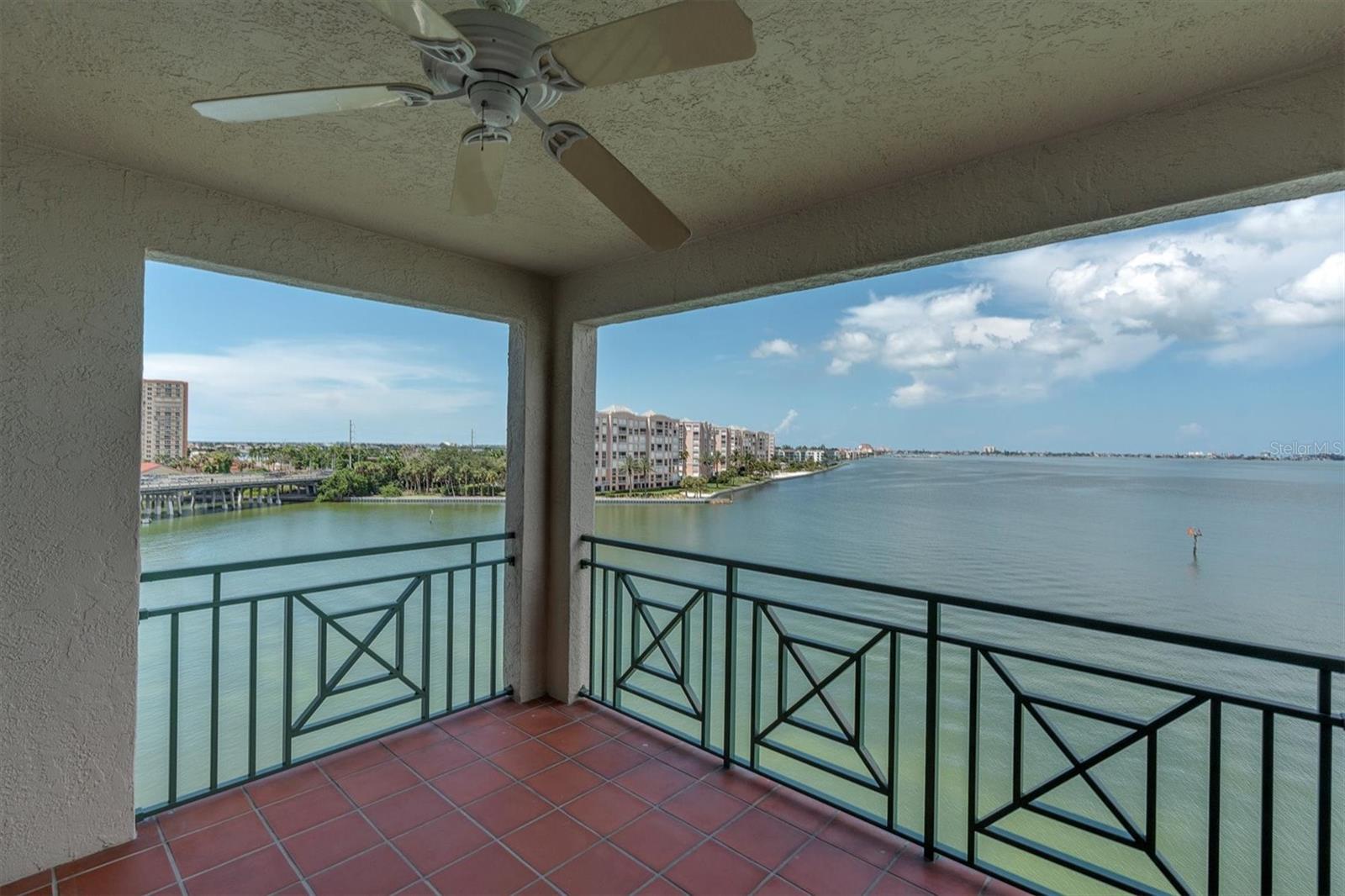 On the Intracoastal waterway with amazing sunset views! Light, bright and airy 2 Bed, 2 bath PLUS den (could be 3rd bedroom) 1,653± sf, 5th floor unit in Osprey Point at Dolphin Cay. Look west over Boca Ciega Bay to find coastal birds, dolphins, rays and manatees in a beautifully landscaped, gate-controlled 88-acre exclusive resort-like paradise.
Unobstructed water and sunset views of Intracoastal Waterway to Don Cesar and beyond from patio, kitchen, dining area, living area, and primary bedroom suite. All-electric kitchen with stove, refrigerator, and microwave, with lots of counter space, cupboards, and a pantry. The Primary bedroom has a walk-in closet and an ensuite bath with two sinks and a separate tub & shower. Tile in living areas, kitchen, and den/office with carpet in bedrooms. Watch sunrises from the front patio. Outside storage closet, with ample storage space. Unit has newer air conditioner and inside laundry. One car assigned parking under the building and one car unassigned outside (no pickup trucks). EV charging stations are outside the building. Common amenities include 3 pools (one at the building), 3 tennis courts, wildlife walkways, large pond, a nature preserve, private beach, beach barbeque area, car wash area with more EV charging stations, library, workout room, pool table, ping pong table, and walking trails through nature preserve and around community lake. Minimum one-year lease. Water, Sewer, basic cable and Trash removal are included in the rent. Move-in: first & last month's rent, $4,395 deposit. HOA Fee one-time $150 and $30 background/credit check. No smoking, no pets.