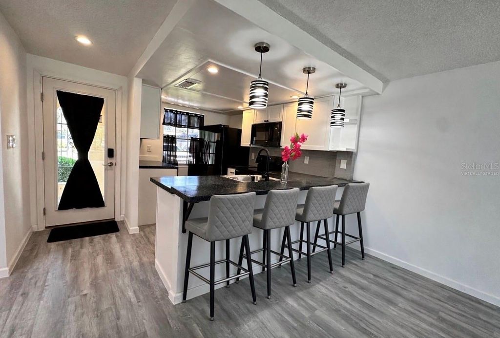 Photo of 4445 Rustic Drive #D, New Port Richey, FL 34652 (MLS # TB8499557)