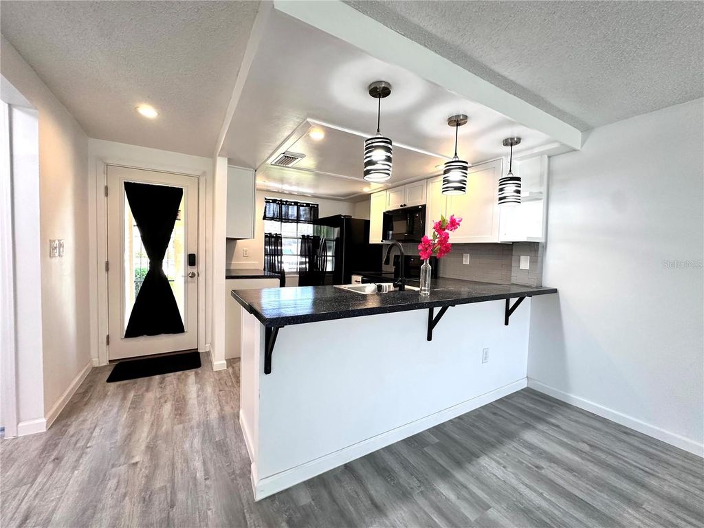 Photo of 4445 Rustic Drive #D, New Port Richey, FL 34652 (MLS # TB8499557)