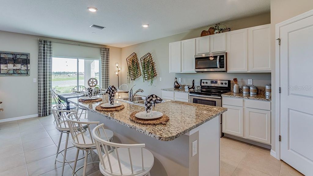 Photo of 11917 Mountain Island Trail, Parrish, FL 34219 (MLS # A4692466)