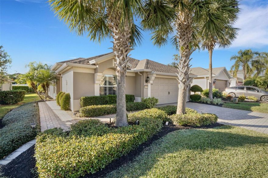 Located in the desired 55+ community of Del Webb Orlando this 3 bedroom, 2 bath Marbella floor plan is perfect for you. You walk through the glass front door with a sidelight into a large living area. The kitchen features granite countertops, backsplash, upgraded cabinets with bottom pullouts, stainless steel appliances, natural gas stove, and an eat-in breakfast nook. The dining area has decorative wainscoting. The large primary bedroom is in the rear of the home for ultimate privacy with a primary bathroom retreat featuring double sinks, and large walk-in shower. The additional two bedrooms are in the front of the home, together with the guest bathroom. You step through large sliding glass doors to the large private covered lanai with a natural gas hook-up for that gas grill or fire pit, and an additional screened-in cage making for a large outdoor living space. A newer natural gas hot water heater is also included. Additional upgrades include a newer roof (2023), newer appliances including a new refrigerator, plantation shutters throughout, and updated landscaping. The $425 semi-annual HOA fee provides 24x7 staffed security gate and master association-owned private road maintenance. Adjacent to recently renovated 18-hole White Heron Golf Club. The $333 monthly Del Webb HOA fee includes lawn maintenance and exclusive access to resident-owned 30,000+ SF Montecito clubhouse and amenities. DEL WEBB ORLANDO is a 55+ community with a tavern, indoor walking track, fitness center, indoor and outdoor pools and spas with locker rooms and showers, billiards, ping pong, craft room, and a ballroom for special events. Outdoor activities include pickleball, tennis, bocce, basketball, shuffleboard, community gardening center, an outdoor amphitheater, large brick fire pit and large screened-in gazebo over the water. Miles of biking and walking trails within Ridgewood Lakes gated community. Located conveniently to shopping at Posner Park (4 miles), Disney World, Universal Studios, Orlando & Central FL entertainment nearby. Easy access to I-4, medical facilities, airports & Sunrail Station. Advent Health hospital is 3 miles away.