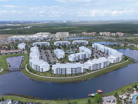 Photo of 3141 Paradox Circle #201, Kissimmee, FL 34746 (MLS # O6395471)