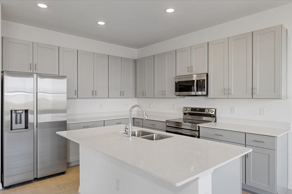 Photo of 218 Tarpon Bay Boulevard, Haines City, FL 33844 (MLS # O6413999)