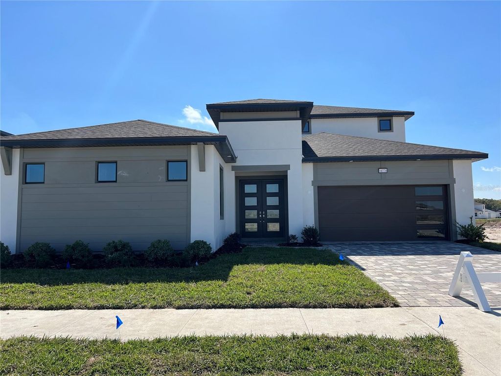 Photo of 10770 Torchwood Sea Way, San Antonio, FL 33576 (MLS # J987077)