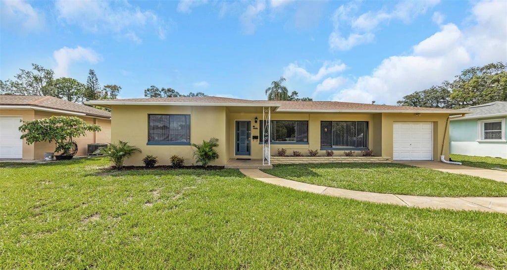 Photo of 210 S Saturn Avenue, Clearwater, FL 33755 (MLS # TB8548626)
