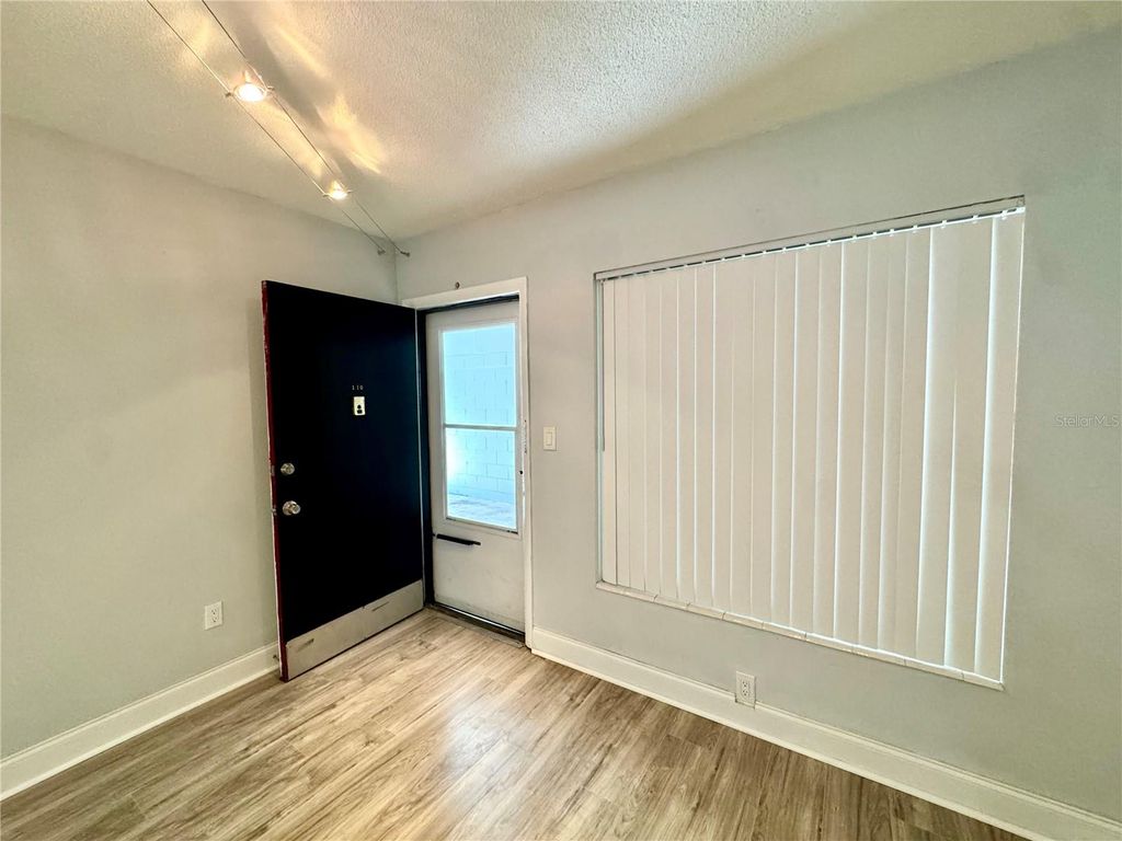 Photo of 825 N Primrose Drive #110, Orlando, FL 32803 (MLS # O6401262)