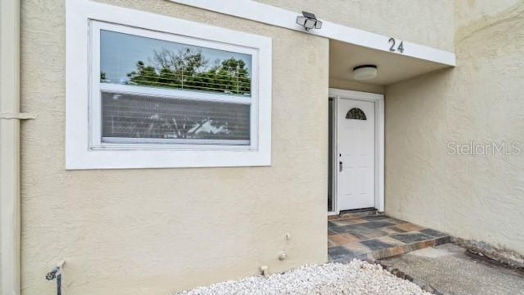 Photo of 2871 S Pines Drive #24, Largo, FL 33771 (MLS # TB8494464)