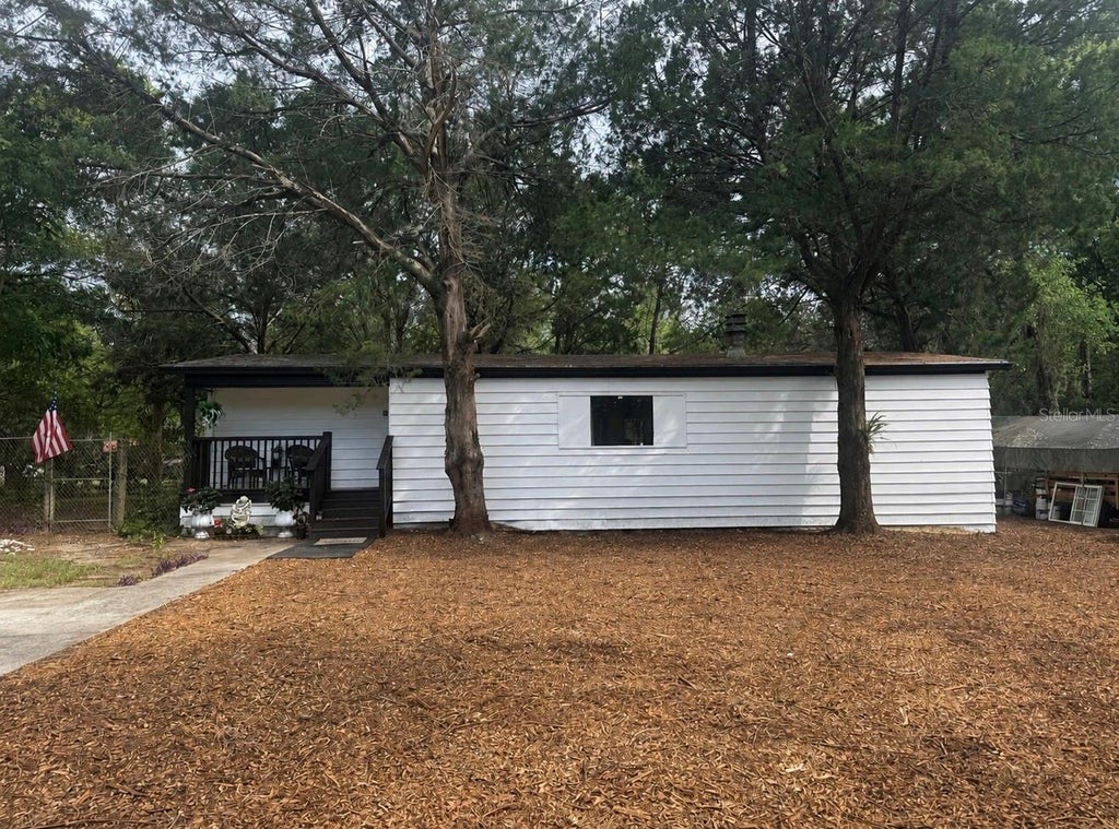Photo of 17718 Rockledge Avenue, Spring Hill, FL 34610 (MLS # TB8518566)
