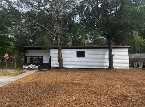 Photo of 17718 Rockledge Avenue, Spring Hill, FL 34610 (MLS # TB8518566)
