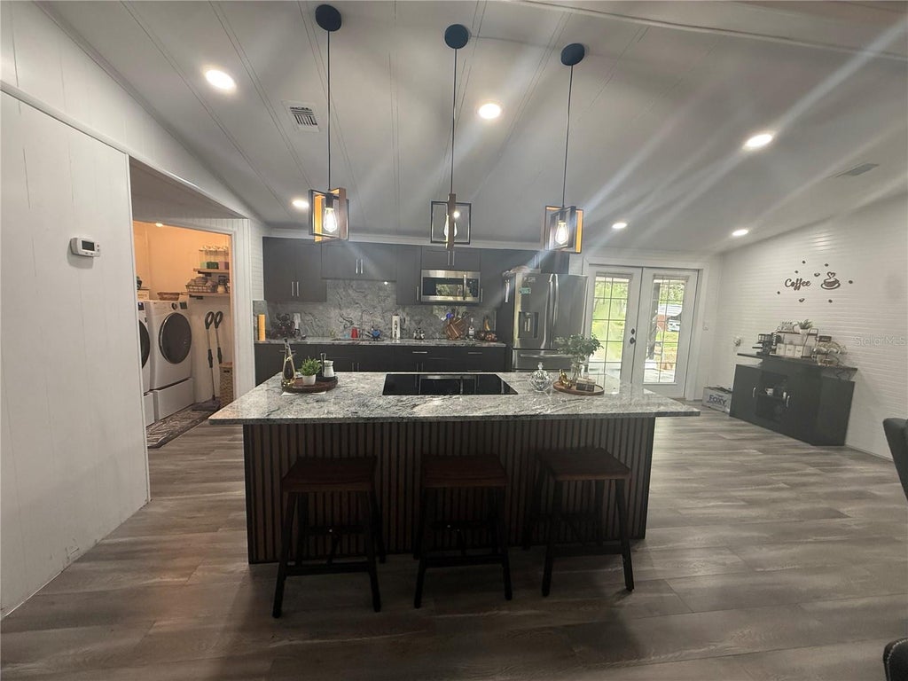 Photo of 17718 Rockledge Avenue, Spring Hill, FL 34610 (MLS # TB8518566)