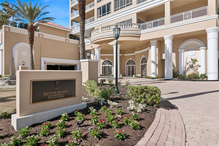 Experience the Ritz-Carlton Lifestyle in the Heart of Downtown Sarasota
This exquisite three-bedroom, three-bathroom residence at The Ritz-Carlton Tower Residences redefines luxury living, offering the feel of a private single-family home with all the conveniences of a world-class condominium. Step from your private elevator into a beautifully appointed, move-in-ready home featuring an open floor plan, designer finishes, and panoramic views of Sarasota Bay and the sparkling city skyline. Two expansive wraparound terraces provide seamless indoor–outdoor living and create the perfect setting for entertaining, watching sunsets, or simply relaxing in your own private oasis.
The residence showcases an open, flowing layout enhanced by elegant chandeliers and designer lighting. Nearly every room captures breathtaking views, while the well-appointed kitchen offers premium features including a Sub-Zero refrigerator, double ovens, and granite countertops. The private primary suite is a peaceful retreat with a spa-style bath and a balcony overlooking the water. Two garage parking spaces—both equipped with EV charging stations—add to the convenience and value of this exceptional property.
The seller will pay in full the final special assessment payment, with 2026 being the last year, already reflected in current association dues. Residents benefit from proactive management and strong financials. The Ritz-Carlton Tower Residences has also undergone elegant renovations, including a stunning new lobby and port cochère, refreshed entry and landscaping, a newly refinished pool and pool deck, an outdoor lounge with grilling area, and beautiful mature foliage. New professional photos of the lobby and pool are coming soon.
Life here is defined by concierge-level service and world-class amenities. Residents enjoy 24/7 staff, a social room, private theater, recreation room, fitness center, heated pool and spa, an outdoor fire table, and barbecue grills. Direct access to the Ritz-Carlton Hotel offers 24-hour in-residence dining and legendary hospitality, further elevating the lifestyle.
The location offers unmatched walkability, with Marina Jack, Bayfront Park, Main Street dining, theaters, Selby Gardens, and Sarasota’s waterfront just steps from your door. This is more than a residence—it is a lifestyle and a rare opportunity to own at one of Sarasota’s most prestigious addresses.