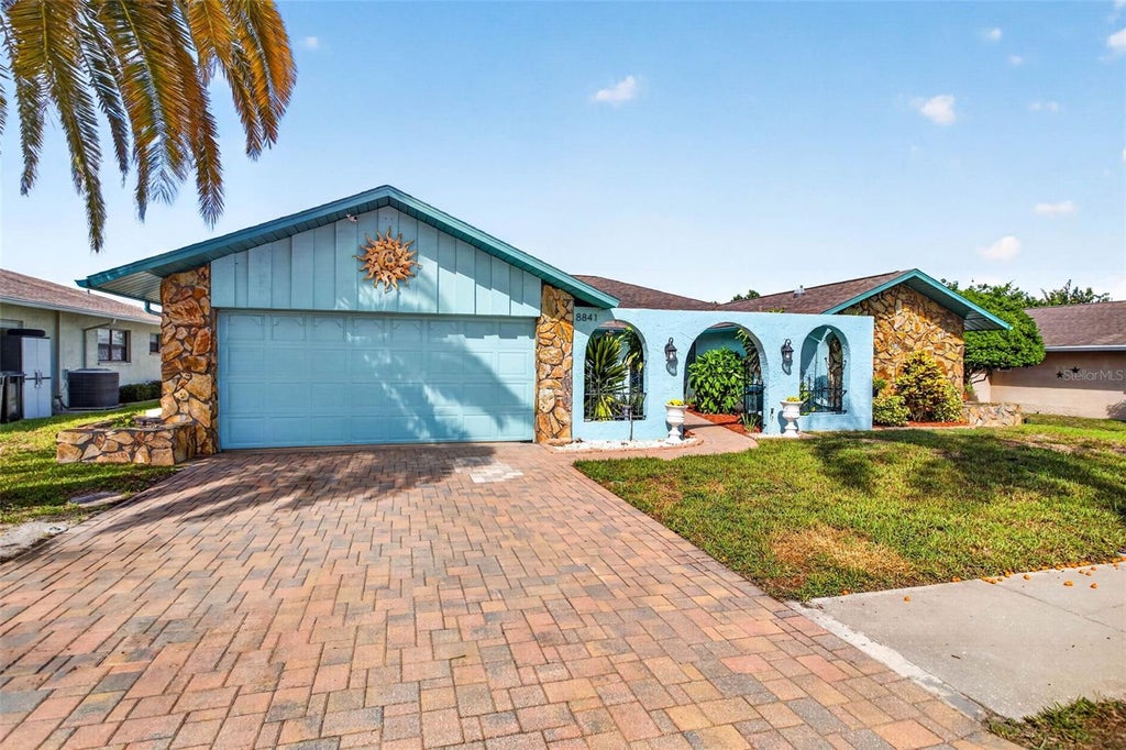 Photo of 8841 Andros Lane, Port Richey, FL 34668 (MLS # TB8550603)