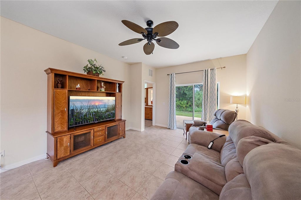 Photo of 11998 Tempest Harbor Loop, Venice, FL 34292 (MLS # N6146092)