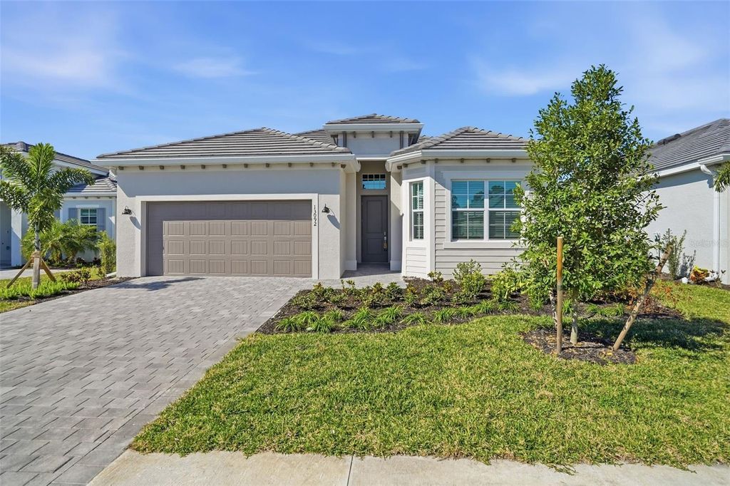 Photo of 13092 Tulum Loop, Venice, FL 34293 (MLS # TB8474343)