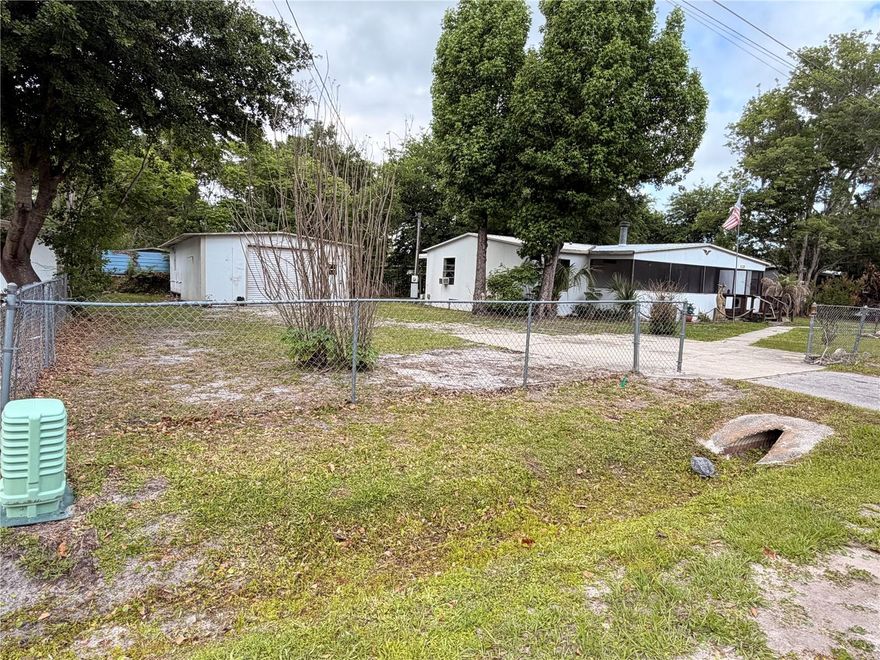 Excellent investment opportunity!  This 3-bedroom, 2-bathroom home offers 1,456 square feet of living space and is the perfect property for those looking to remodel and add value. Situated on an oversized lot with a fully fenced yard, the property provides plenty of room for outdoor living, storage, or future improvements. The home features a spacious 36’x6’ front screened-in porch, ideal for enjoying Florida’s natural surroundings, as well as a large 26’x10’ rear enclosed porch that adds additional usable space. A detached garage/workshop offers excellent potential for hobbies, storage, or workspace needs. With a solid layout and desirable features already in place, this property is ready for your vision and updates. Conveniently located near the St. Johns River, you’ll enjoy easy access to boating, fishing, and all the outdoor activities Astor is known for. Whether you’re an investor, flipper, or buyer looking to create your own space, this property presents a fantastic opportunity with endless potential. An additional single lot located next door is also available for purchase, offering the potential to create a rare triple-lot property. MLS# R4911153
