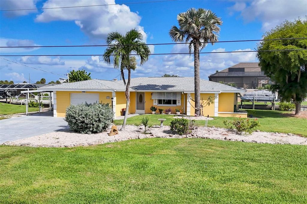 Photo of 1952 Arkansas Avenue, Englewood, FL 34224 (MLS # D6143457)