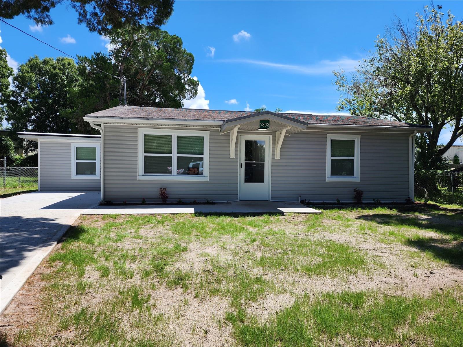 Completely Transformed in Port Richey!
This beautifully renovated 4-bedroom, 2-bath home has been reimagined from top to bottom with modern upgrades and thoughtful design. Freshly painted inside and out, it features durable ceramic tile flooring throughout—no carpet anywhere—and brand-new Energy Star vinyl windows for efficiency and comfort.
Step into the chef’s kitchen, where you’ll find all-new stainless steel appliances, granite countertops, a stylish ceramic backsplash, farmhouse sink with pull-down faucet, and a breakfast bar accented with shiplap trim. Both bathrooms and all lighting fixtures have been tastefully updated, while new raised-panel interior doors, hardware, and trim complete the fresh interior look.
Major updates give peace of mind: new central A/C plus a mini-split in the primary suite, updated plumbing and wiring, all new ductwork, one new electric panel and 2nd panel to be replaced soon. There’s also a convenient indoor laundry area with stackable washer/dryer hook-up.
Outside, enjoy the low-maintenance insulated vinyl siding, a new concrete driveway, sidewalk, and back patio overlooking a large fenced yard with storage shed (new roof included!).
Located in an up-and-coming area of Port Richey, this home hasn't taken on floodwaters since the current owners purchased in 2013—even through two recent hurricanes—despite being in an AE flood zone.
Move-in ready and fully transformed—schedule your showing today!