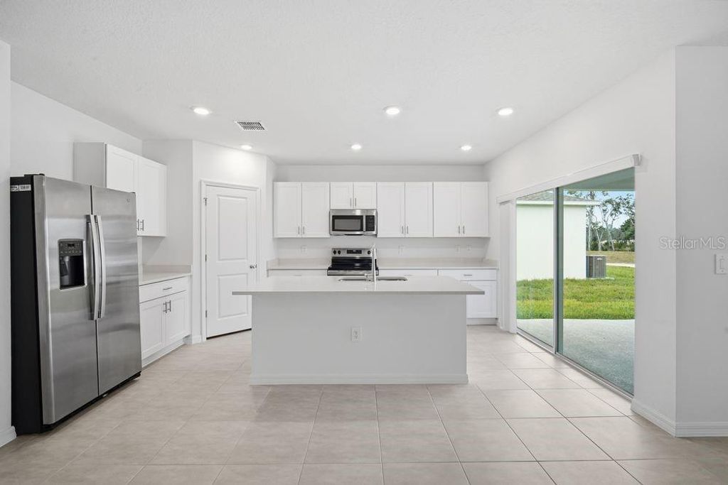 Photo of 13634 Tropical Breeze Way, Hudson, FL 34669 (MLS # A4652563)