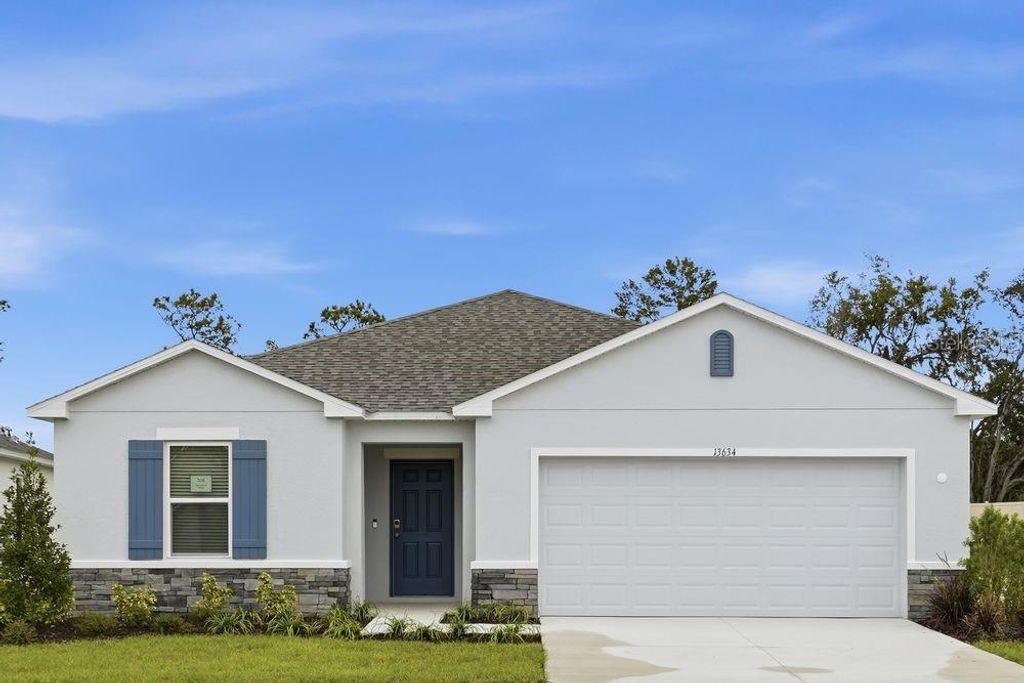 Photo of 13634 Tropical Breeze Way, Hudson, FL 34669 (MLS # A4652563)