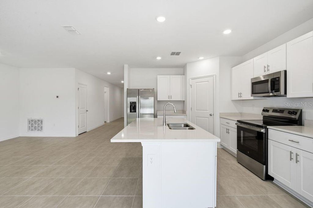 Photo of 13634 Tropical Breeze Way, Hudson, FL 34669 (MLS # A4652563)