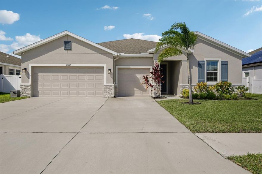 Step inside this inviting 4-bedroom, 3.5-bath home with a 3-car garage and an open, airy layout made for easy living and entertaining. This unique floorplan features a separate side entrance into a multi-generational suite. The kitchen takes center stage with staggered, crown-molded cabinetry, gleaming granite counters, and a full stainless-steel appliance suite. Soaring ceilings and natural light create a bright, spacious feel throughout. The large ensuite offers a peaceful retreat with a soaking tub, large walk-in shower, and double vanities. Enjoy evenings on the covered lanai and make this thoughtfully designed home your own. Located in the small secluded community of Talavera, this home is sure to impress! Schedule your tour today!