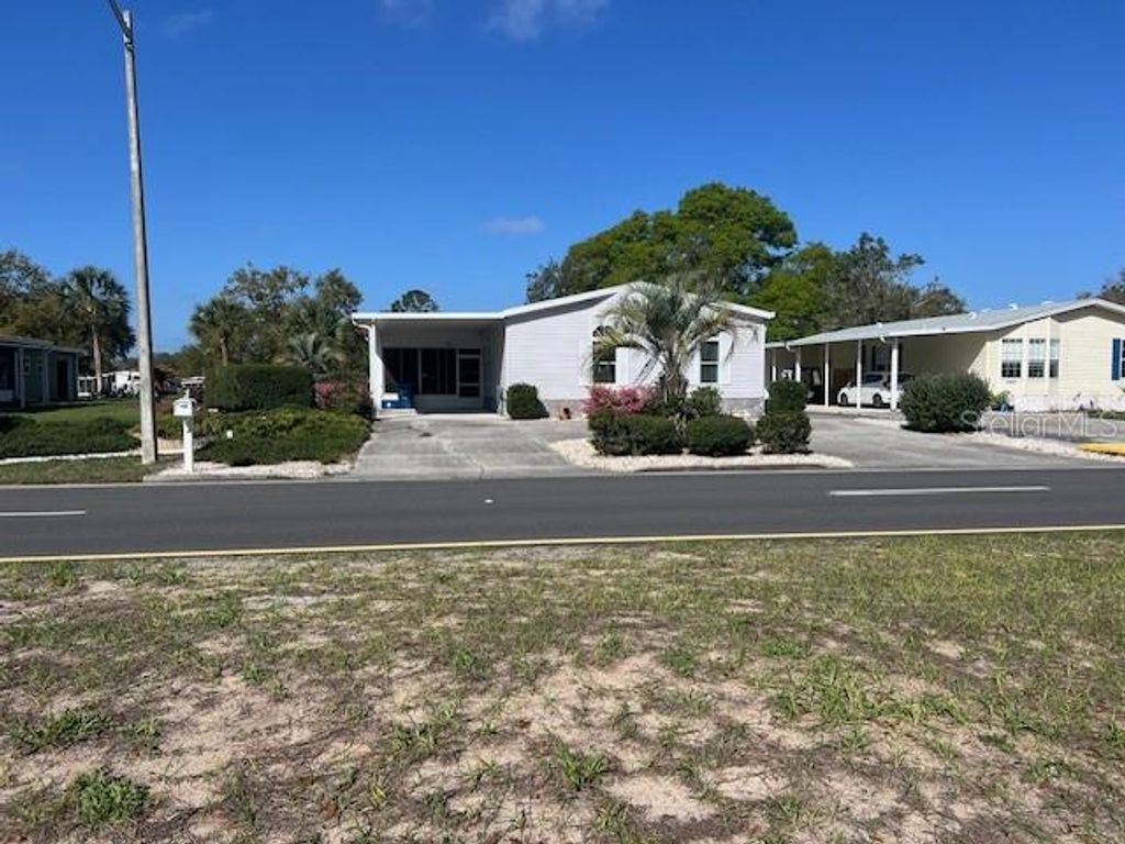 Photo of 15025 Brookridge Boulevard, Brooksville, FL 34614 (MLS # W7883797)