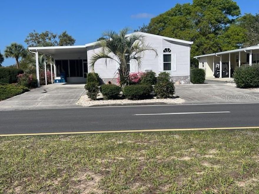 Welcome Home to Your Brookridge Retreat: Have you ever walked into a home and instantly felt, this is the one? This beautifully maintained furnished property in the sought-after 55+ community of Brookridge, delivers that feeling and so much more. Interior Highlights: Open floor plan with abundant natural light, vaulted ceilings and a soothing color palette. Spacious bedrooms, an eat-in kitchen featuring island with cooktop. A built in oven and microwave, both have convection capabilities. An attached formal dining room with an expandable dining table, for extra seating. A rear sunroom with wet bar -- perfect for relaxing or entertaining. An office with French doors, a charming window seat, built in cabinetry and shelving. Also, a sleeper sofa offers extra guest accommodations. Indoor laundry room with additional storage, mop sink and central vac system. Primary suite has a large closet with built-ins, en suite offers a walk-in linen closet, glass enclosed shower, a double vanity and extra cabinetry. Cooling ceiling fans, easy-care flooring, crown molding, and thoughtful details throughout. Outdoor Living: Resort-style outdoor entertaining spaces. Low-maintenance stone yard with concrete walkways surrounding the property. Oversized carport with extra parking and a circle drive. An attached workshop large enough for two golf carts. Shelving for storage and some tools are also included. A handy feature is the garage door opener, for easy in and out golf cart driving. Enclosed front porch with glass windows that open to circulate fresh air. SELLER IS LEAVING A GOLF CART FOR THE NEW BUYERS ALSO. Recent Updates: New Roof (2022), New AC (2022), New Window Blinds (2026). Community Perks: Brookridge is an active 55+ gated community offering: Sparkling swimming pool, 18 hole golf course, Shuffleboard, Fitness center, Library, Security patrol, Clubs, activities, and social events daily, weekly, and monthly. Your furry friends are welcome here too! Prime Location: Situated on Florida's west coast, just moments from: Weeki Wachee Springs and its famous mermaids. The Suncoast Parkway (589) for easy access to Tampa and the airport Shopping, dining, and medical facilities nearby. Call today and preview this home before its too gone....
