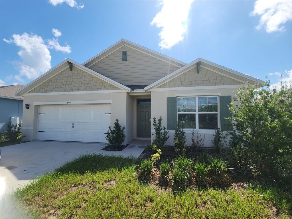 Photo of 1645 Buttonwood Way, Haines City, FL 33844 (MLS # G5106207)