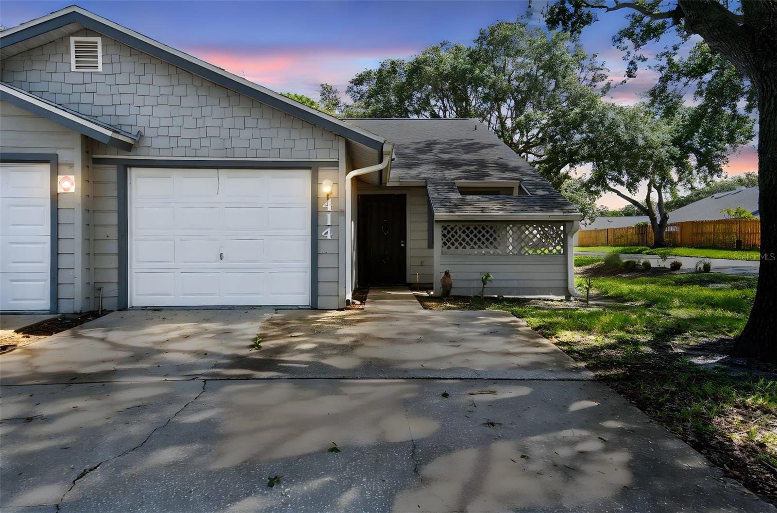 Opportunity Knocks in the Woods of Anderson Park! Discover comfort and convenience in this tucked-away end-unit villa located in the desirable Woods of Anderson Park community. Recently updated with a newer roof and featuring modern windows throughout, this charming home is filled with natural light. Step through a private breezeway into the bright and airy living space, complete with vaulted ceilings and a skylight that enhances the open feel. The eat-in kitchen overlooks the living area, making it perfect for both everyday living and entertaining. The spacious primary bedroom features a walk-in closet, an en-suite bath with a walk-in shower, and direct access to the serene outdoor living area—your personal retreat. An attached one-car garage adds convenience and extra storage. Enjoy a short walk to the community pool, clubhouse, and fitness center. You’ll also love the close proximity to beautiful parks, stunning beaches, popular restaurants, and the historic Sponge Docks. This is more than a home—it’s a lifestyle. Don’t miss your chance to make it yours!