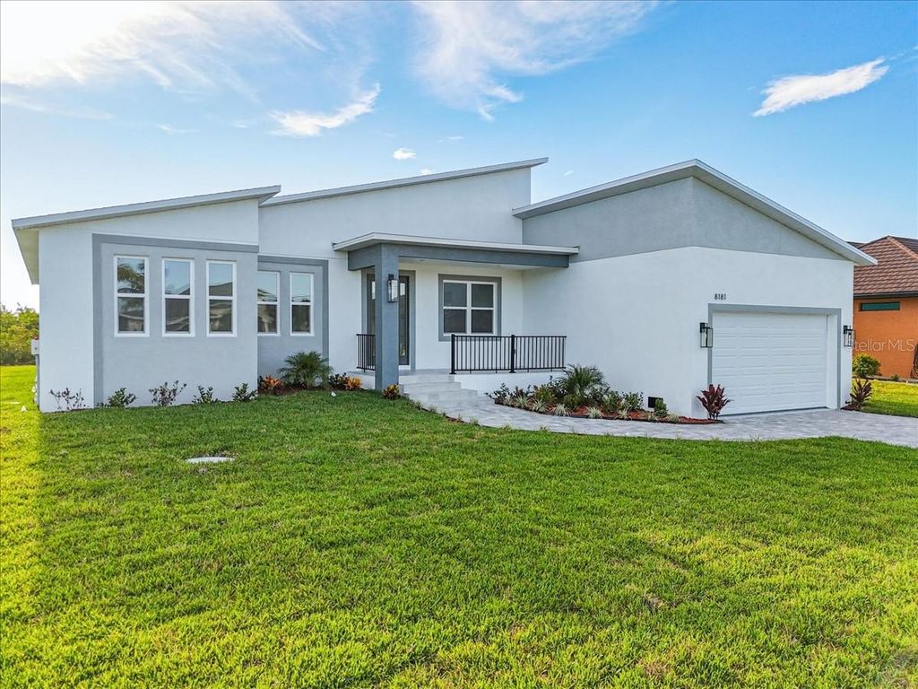 Photo of 8181 Tecumseh Circle, Port Charlotte, FL 33981 (MLS # N6144177)