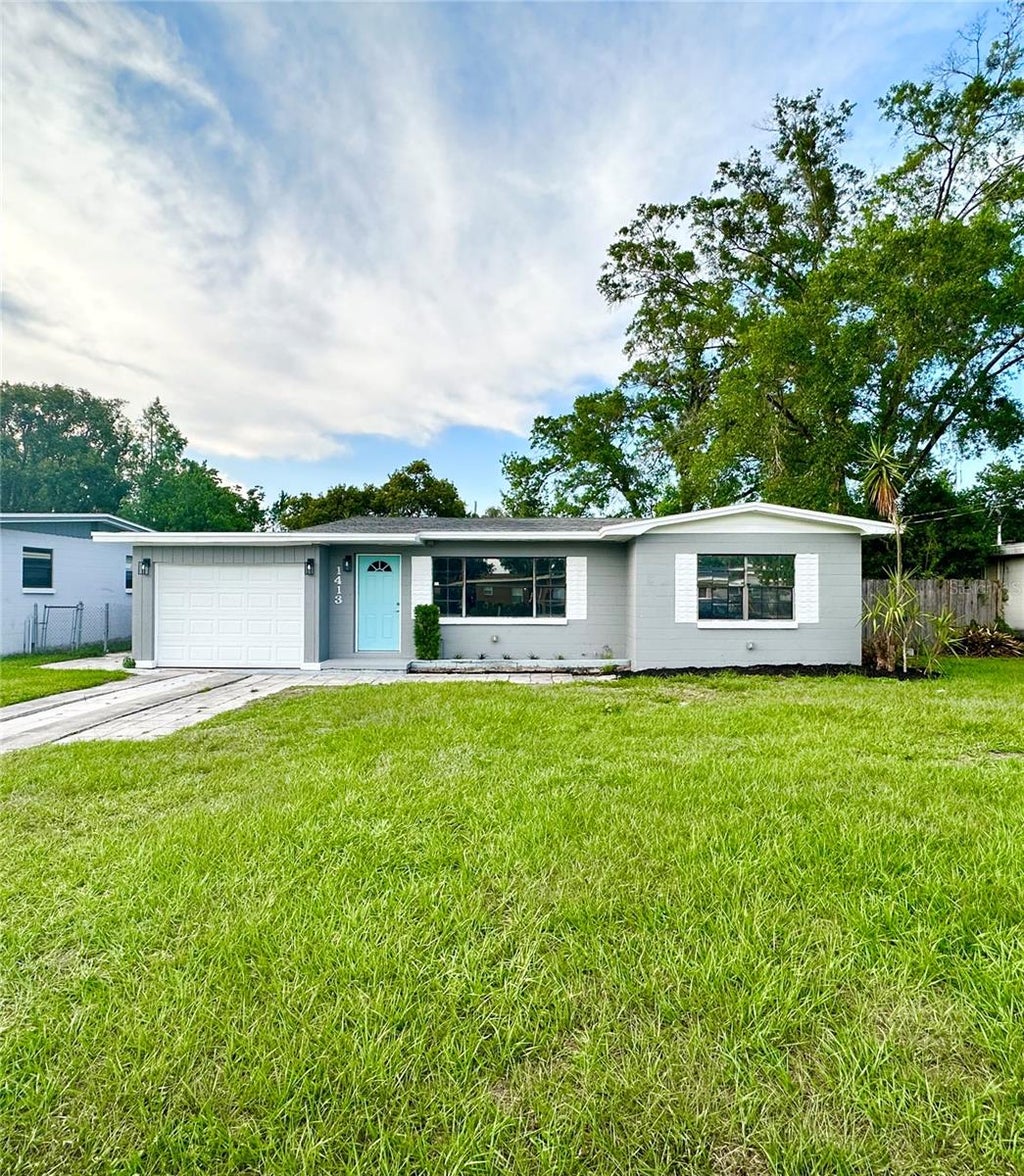 Photo of 1413 Carlson Drive, Orlando, FL 32804 (MLS # O6419124)