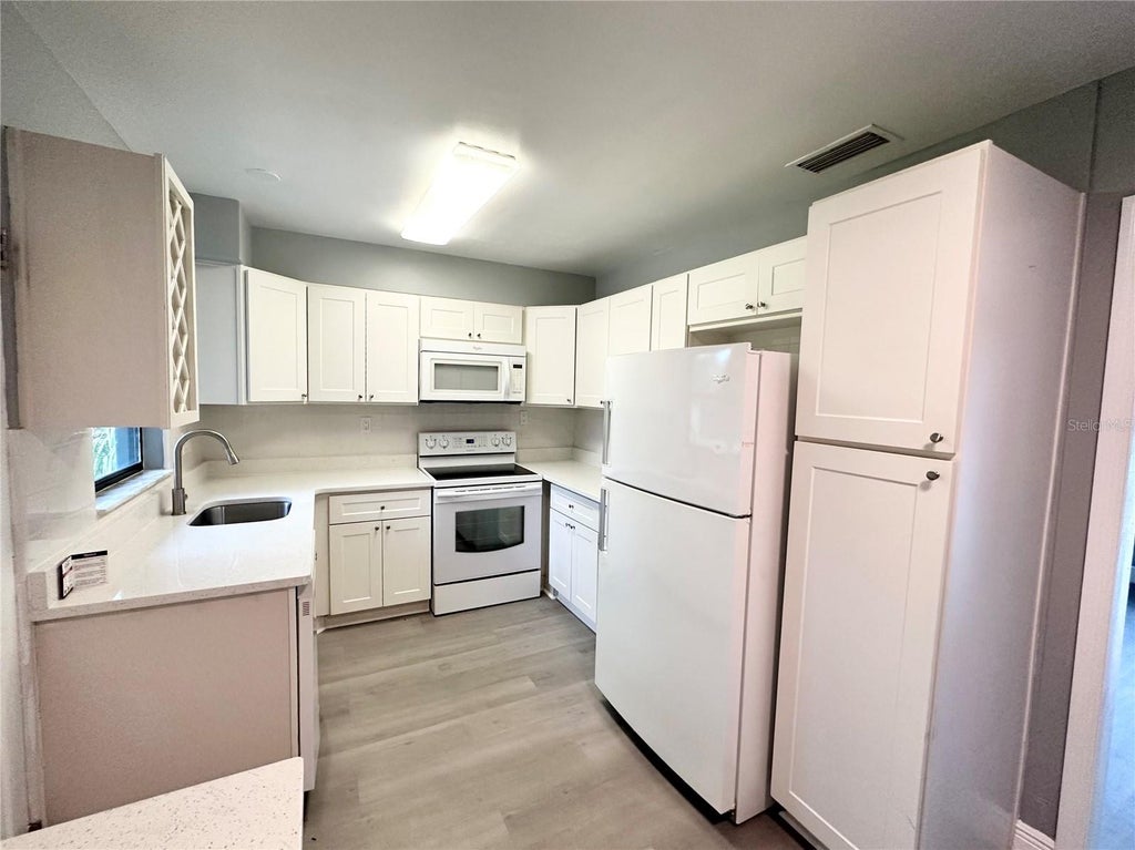 Photo of 1413 Carlson Drive, Orlando, FL 32804 (MLS # O6419124)