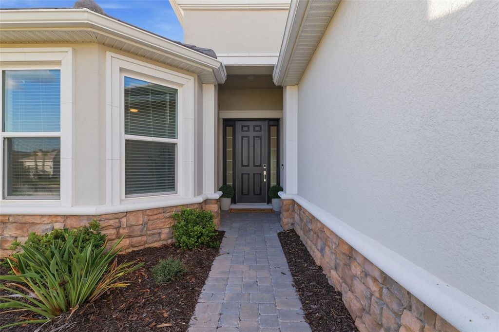 Photo of 4533 Isonzo Way, Wesley Chapel, FL 33543 (MLS # W7883832)
