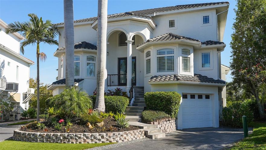 Introducing a Luxury Waterfront Residence in Hawks Harbor. Welcome to an exceptional luxury residence located in the prestigious, gated waterfront community of Hawks Harbor. Offering an unparalleled lifestyle, the home features four bedrooms and four and a half bathrooms, perfectly designed for both comfort and sophistication. Upon entering, a wall of windows and soaring ceilings fill the great room with an abundance of natural light. The open-concept floor plan flows into a recently updated kitchen, which showcases quartz countertops, new appliances, a butler’s pantry, and both casual and formal dining areas. The main level includes a spacious primary suite and a second en-suite guest bedroom for optimal convenience. Upstairs, two additional en-suite bedrooms open onto a private 21-foot balcony, offering tranquil views and a perfect retreat for your guests. The property boasts a spacious pool and hot tub area, ideal for relaxation and entertaining. Situated amongst lush tropical landscaping, the home is its own private oasis. The residence also includes an air-conditioned five-car garage with epoxy floors, abundant storage, and a dedicated workshop - perfect for the car enthusiast. The private dock is equipped with a 16,000 lb lift, providing seamless access to Sarasota Bay, the Gulf of Mexico, and the Gulf Coast’s award-winning beaches.
An elevator services all three levels, ensuring ease and comfort throughout the home. Step outside to enjoy the saltwater, heated pool and spa, a retractable screened lanai, and mature plantings that enhance the outdoor living experience. The home has been thoughtfully renovated, featuring a completely remodeled kitchen and bathrooms, new tile flooring, carpet, lighting, and hardware throughout. Plantation shutters and UV-tinted windows add comfort and energy efficiency. The garage has been upgraded with epoxy floors, LED lighting, and custom cabinetry. Dock and patio enhancements, resurfaced pool and spa with new tile, pump, and jets, new pavers, and over 30 low-voltage landscape lighting fixtures further elevate the property’s appeal. Ideally situated just minutes from downtown Sarasota, the home provides direct access to world-renowned beaches with no bridges between you and open water. The prime location of Hawks Harbor offers convenient proximity to Sarasota Airport, fine dining, shopping, Sarasota’s world-renowned arts, performance, and entertainment, St. Armand's Circle, Anna Maria Island, Lido Key, IMG Academy, and a host of other amenities in Sarasota and Bradenton.