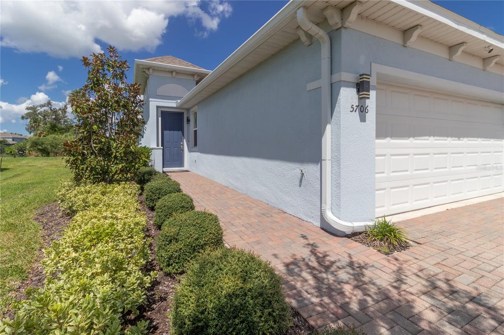 Photo of 5706 Mezzana Run, Palmetto, FL 34221 (MLS # A4706038)