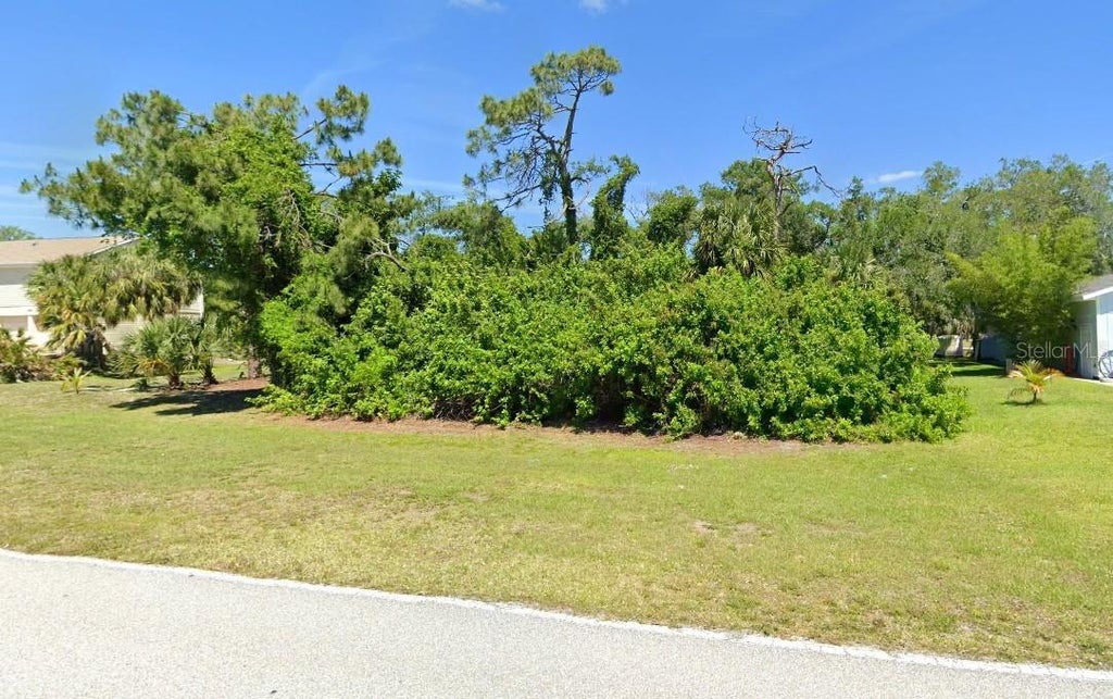 Photo of 11458 Gulfstream Boulevard, Port Charlotte, FL 33981 (MLS # C7532513)